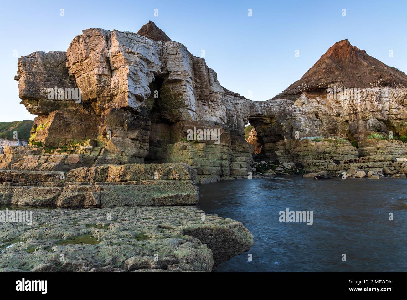 Thornwick Nab is an impressive sea stack and arch at Thornwick Bay on the East Yorkshire coast, England, Uk Stock Photo