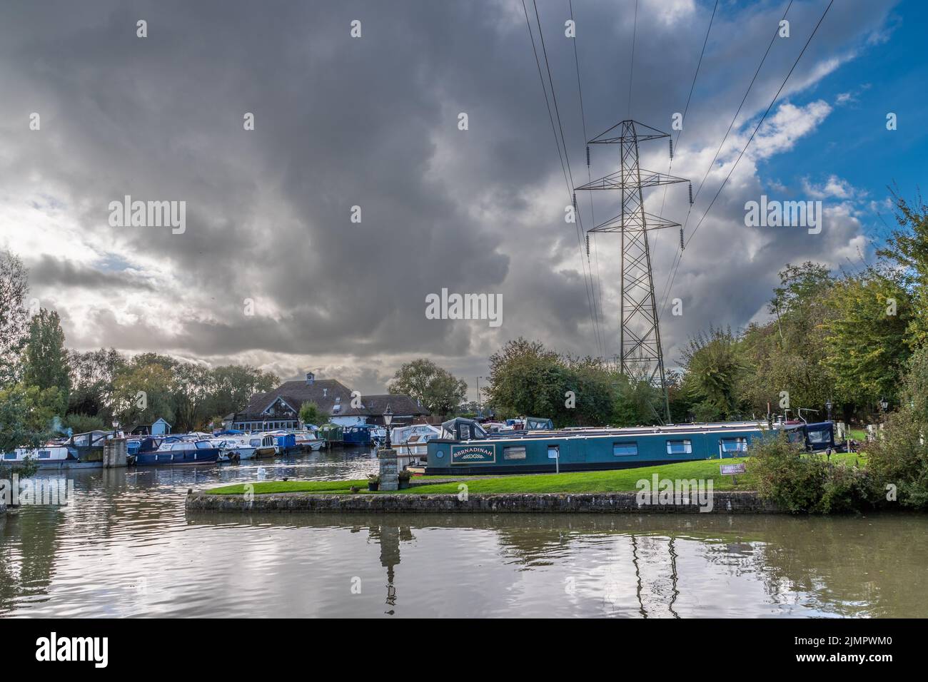 A view of Bradford on Avon marina with an electricity pylon towering