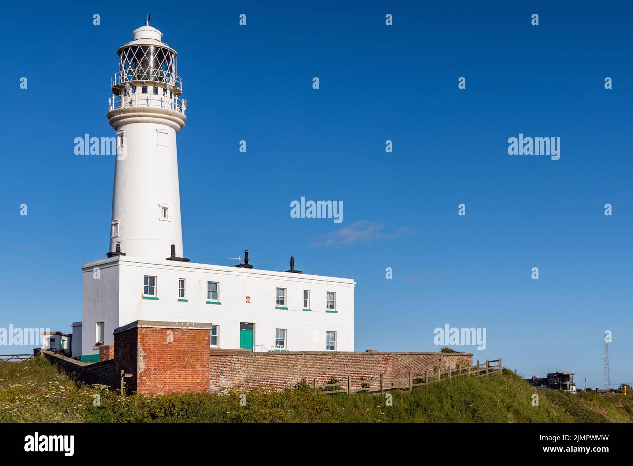 The current lighthouse at Flamborough Head on the East Yorkshire coast was built in 1806, and replaced the old lighthouse which was built in 1674. Stock Photo