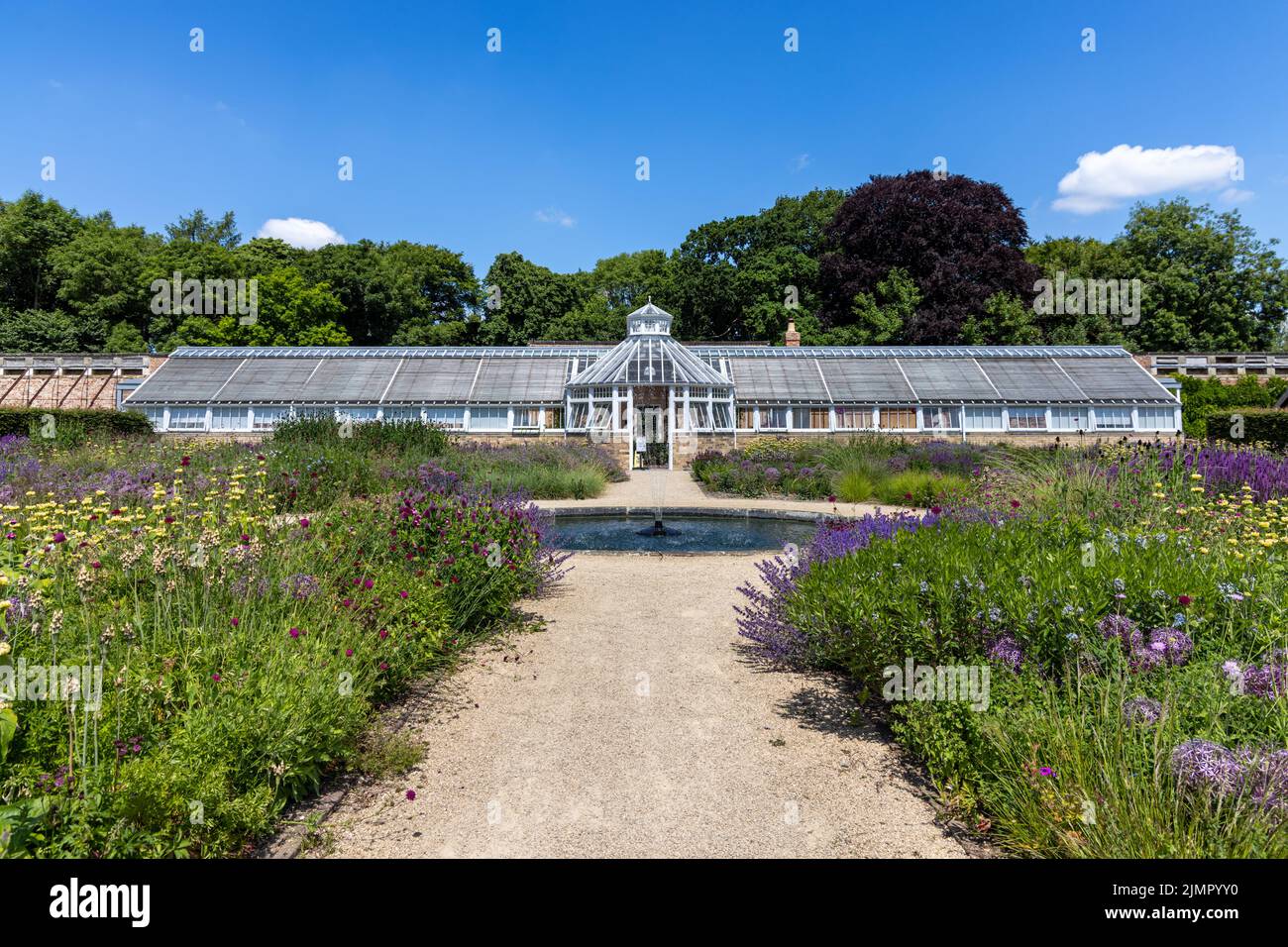 Scampston Hall Walled Garden and William Richardson conservatory, North Yorkshire, in summer. A four acre contemporary garden designed by Piet Oudolf. Stock Photo