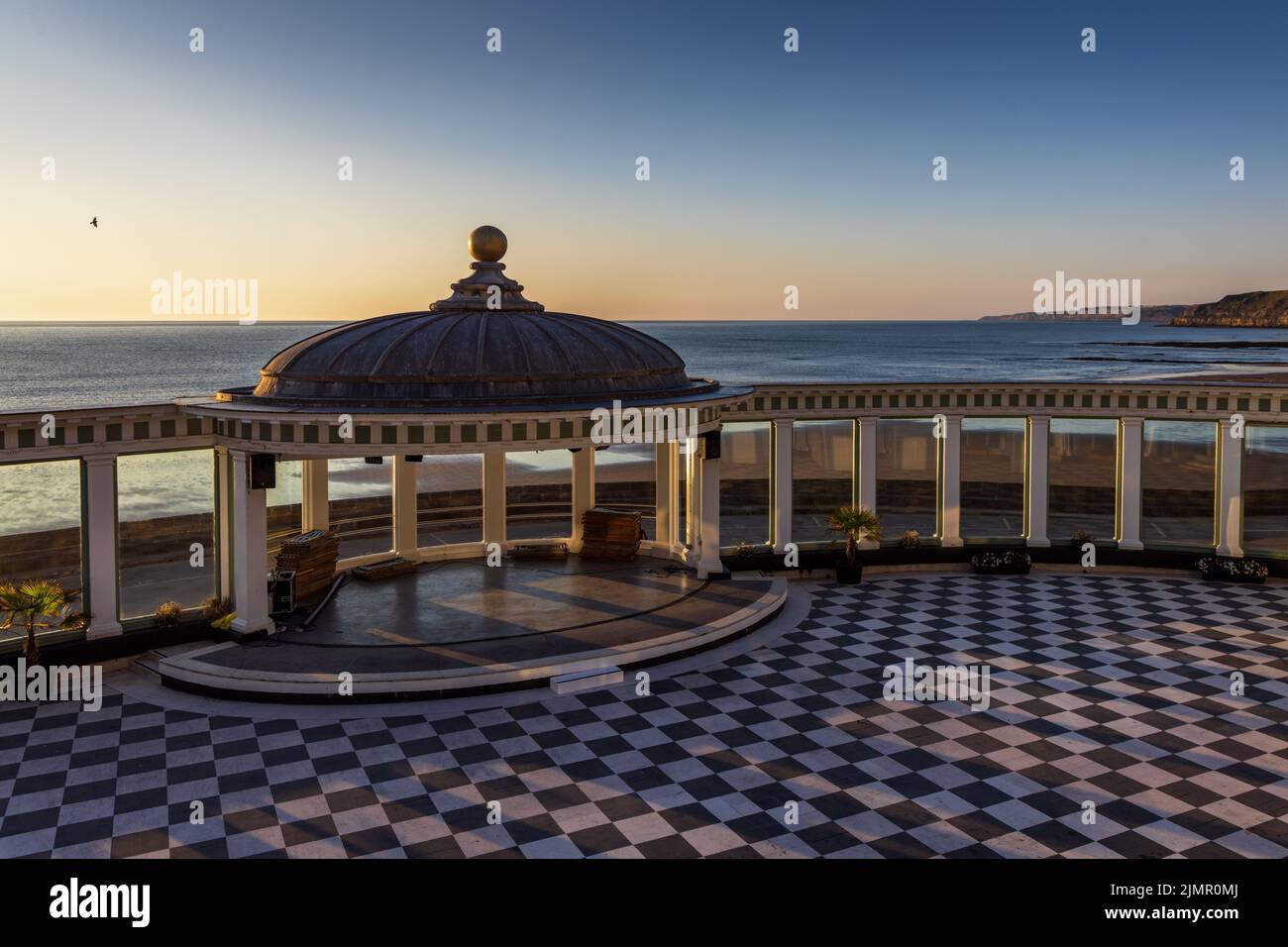 The Spa bandstand and view out to sea at sunrise, South Bay, Scarborough, North Yorkshire, England. Stock Photo