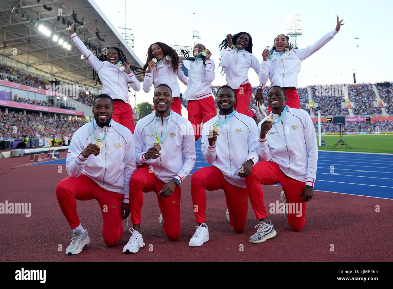 England Men (front) with their Gold Medals and England Women with their Silver Medals after the 4 x 100m Relay Finals at Alexander Stadium on day ten of the 2022 Commonwealth Games in Birmingham. Picture date: Sunday August 7, 2022. Stock Photo