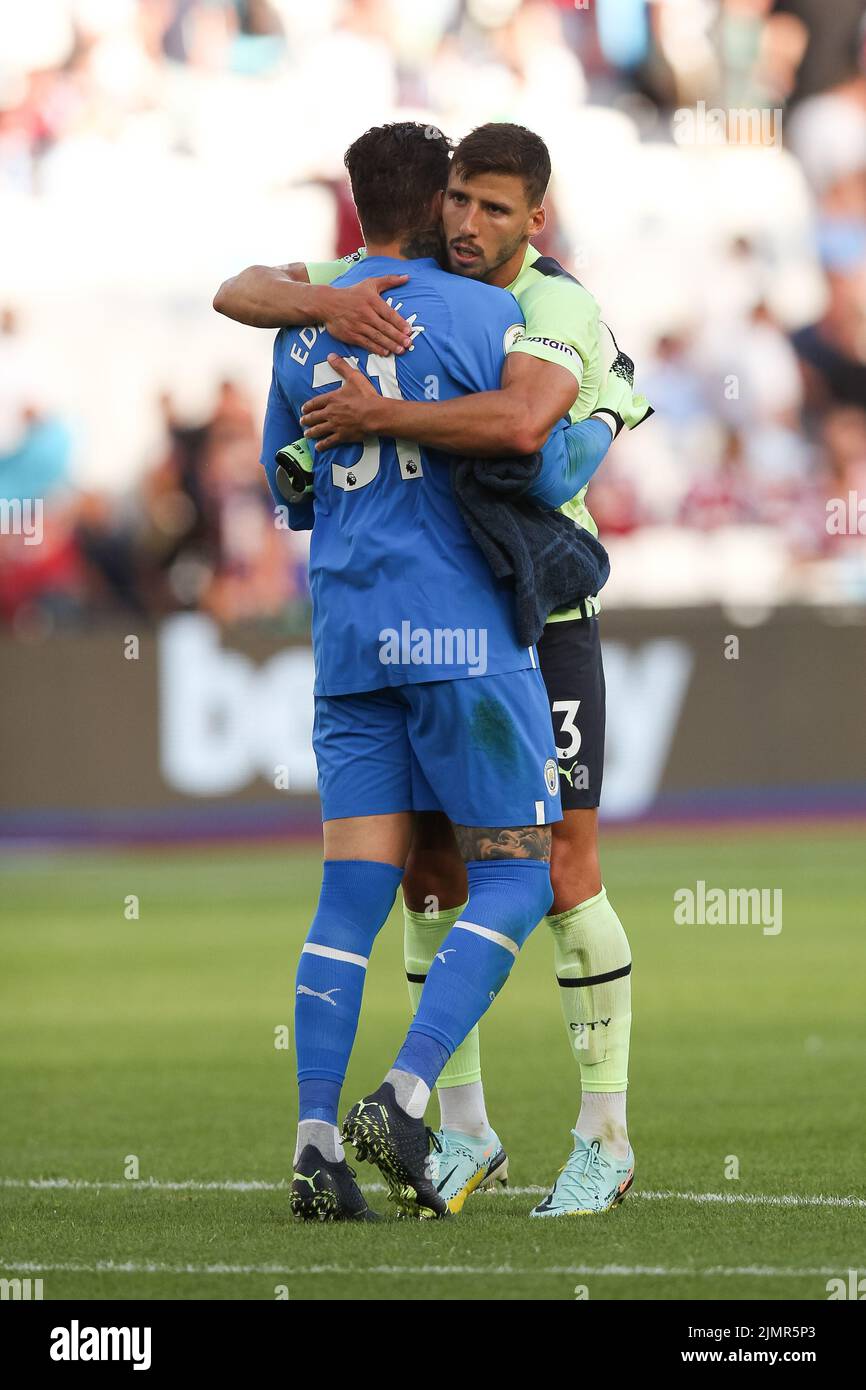 London, UK. 07th Aug, 2022. Manchester City Goalkeeper Ederson and Rœben Dias of Manchester City hug at full time during the Premier League match between West Ham United and Manchester City at the London Stadium, Queen Elizabeth Olympic Park, London, England on 7 August 2022. Photo by Ken Sparks. Editorial use only, license required for commercial use. No use in betting, games or a single club/league/player publications. Credit: UK Sports Pics Ltd/Alamy Live News Stock Photo