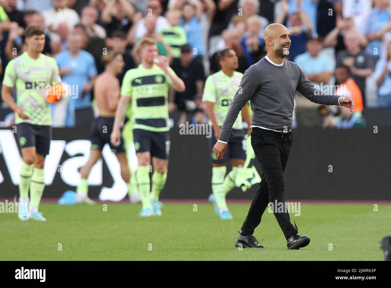 London, UK. 07th Aug, 2022. A happy Manchester City Manager Pep Guardiola leaves the pitch at full time during the Premier League match between West Ham United and Manchester City at the London Stadium, Queen Elizabeth Olympic Park, London, England on 7 August 2022. Photo by Ken Sparks. Editorial use only, license required for commercial use. No use in betting, games or a single club/league/player publications. Credit: UK Sports Pics Ltd/Alamy Live News Stock Photo