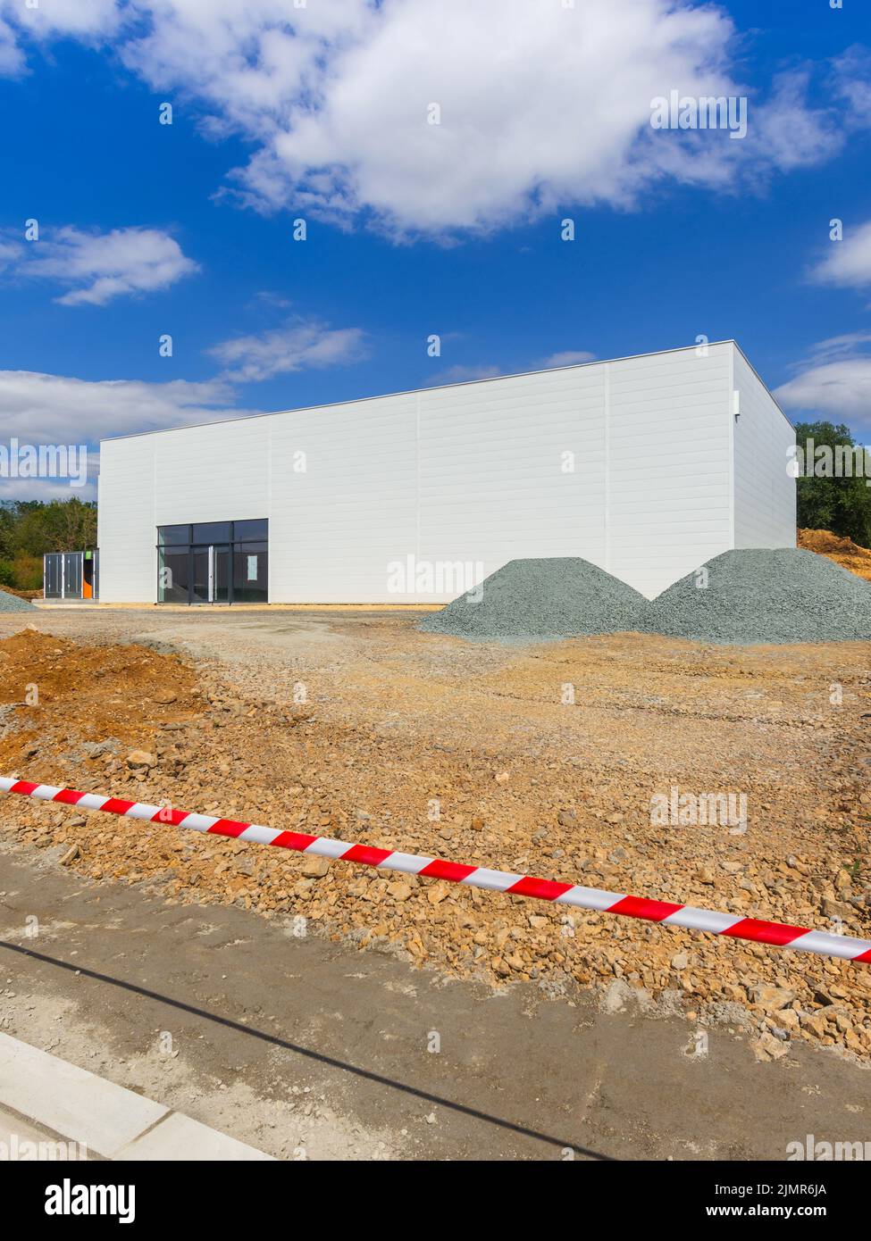 New modern commercial storage building in course of construction in south Chatellerault, Vienne (86), France. Stock Photo