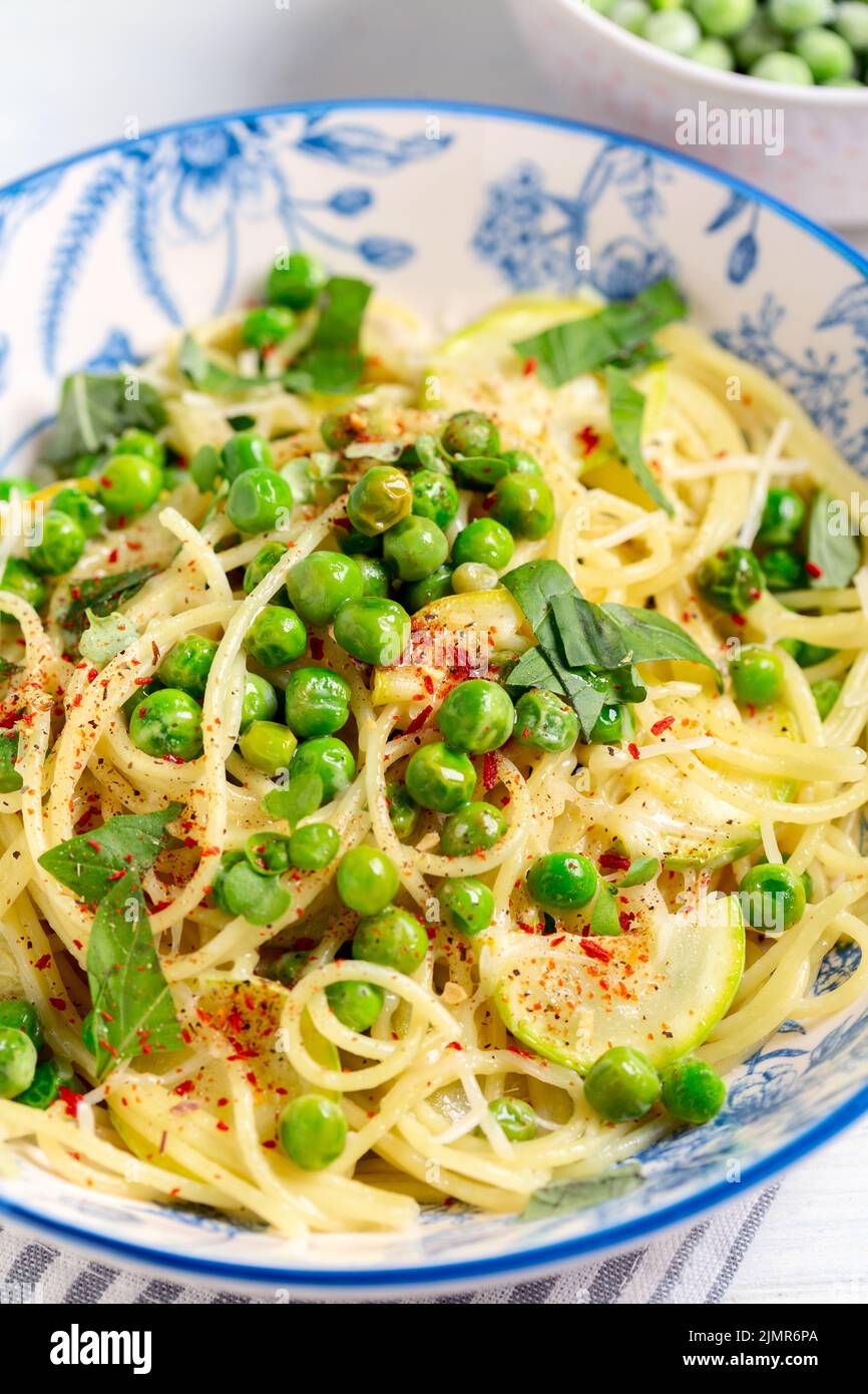 Italian spaghetti pasta with green peas Stock Photo Alamy