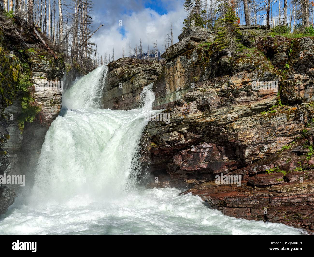 Spring runoff at St. Mary Falls in Montana Stock Photo