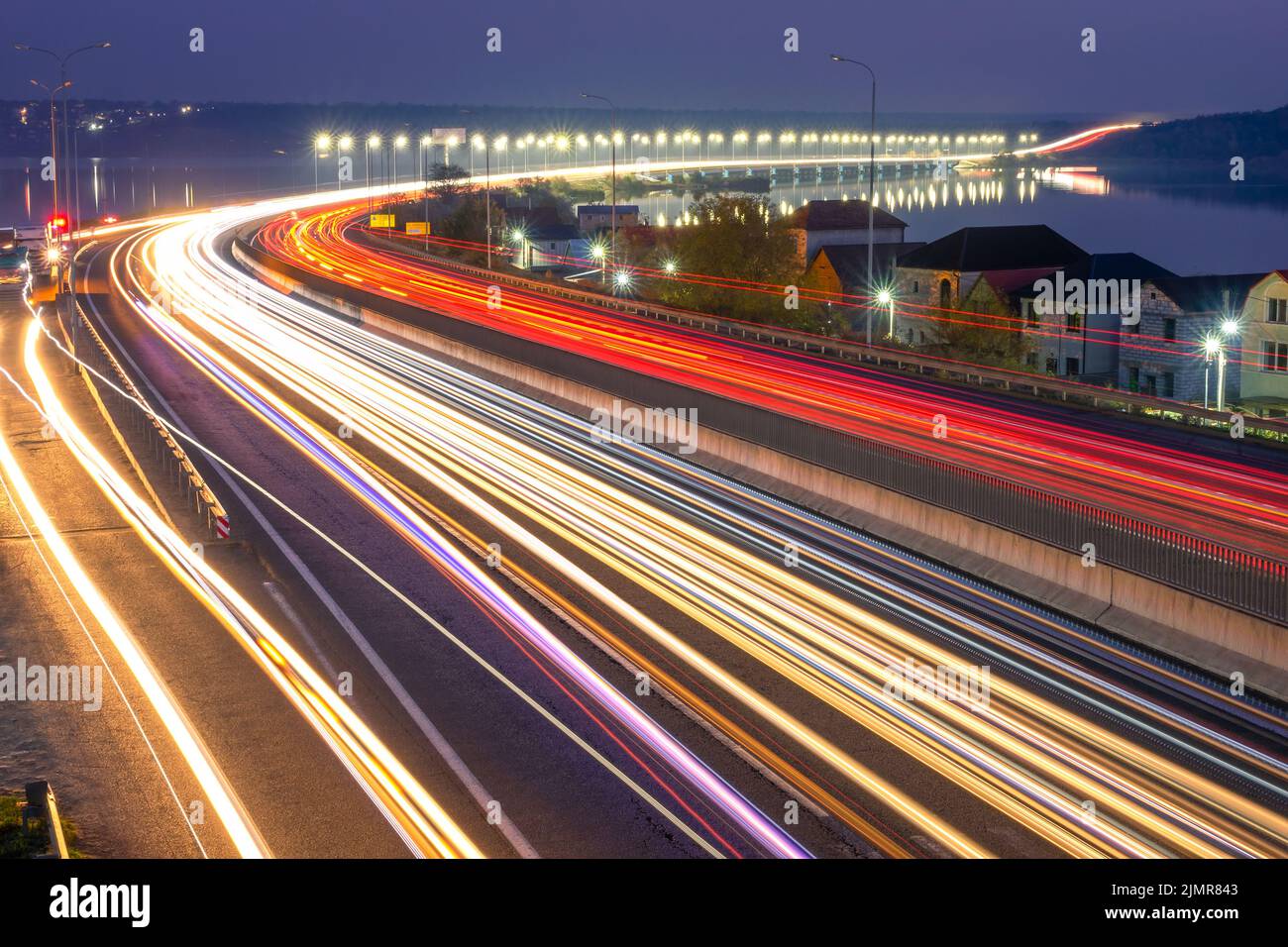 Evening Car Traffic With Trails on the Highway in Ukraine Stock Photo