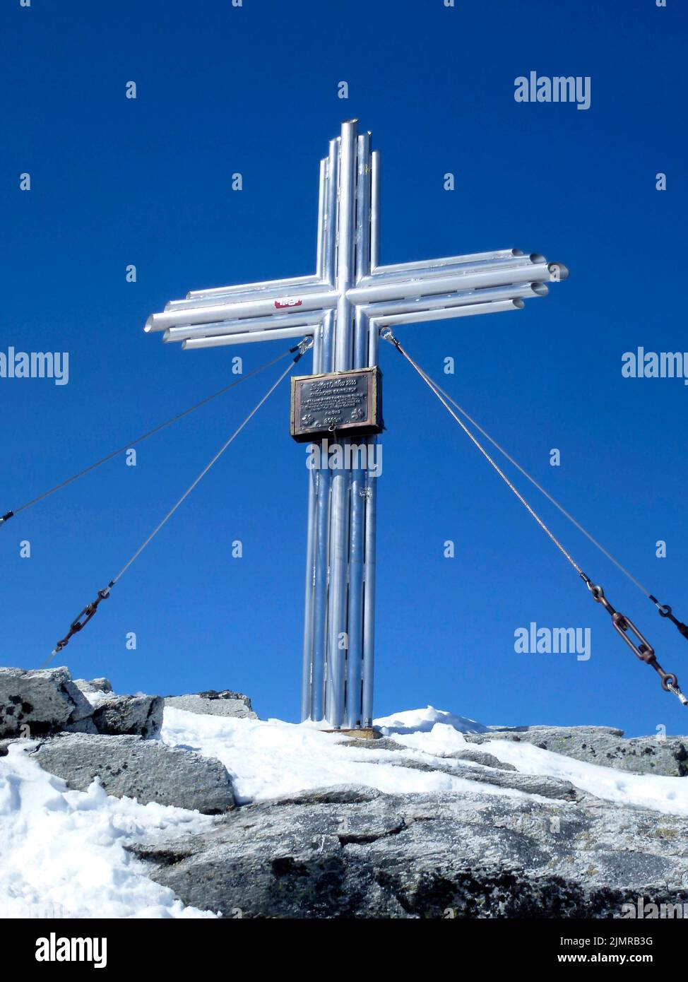 Summit cross Stubacher Sonnblick mountain, alpine ski tour, Tyrol, Austria Stock Photo