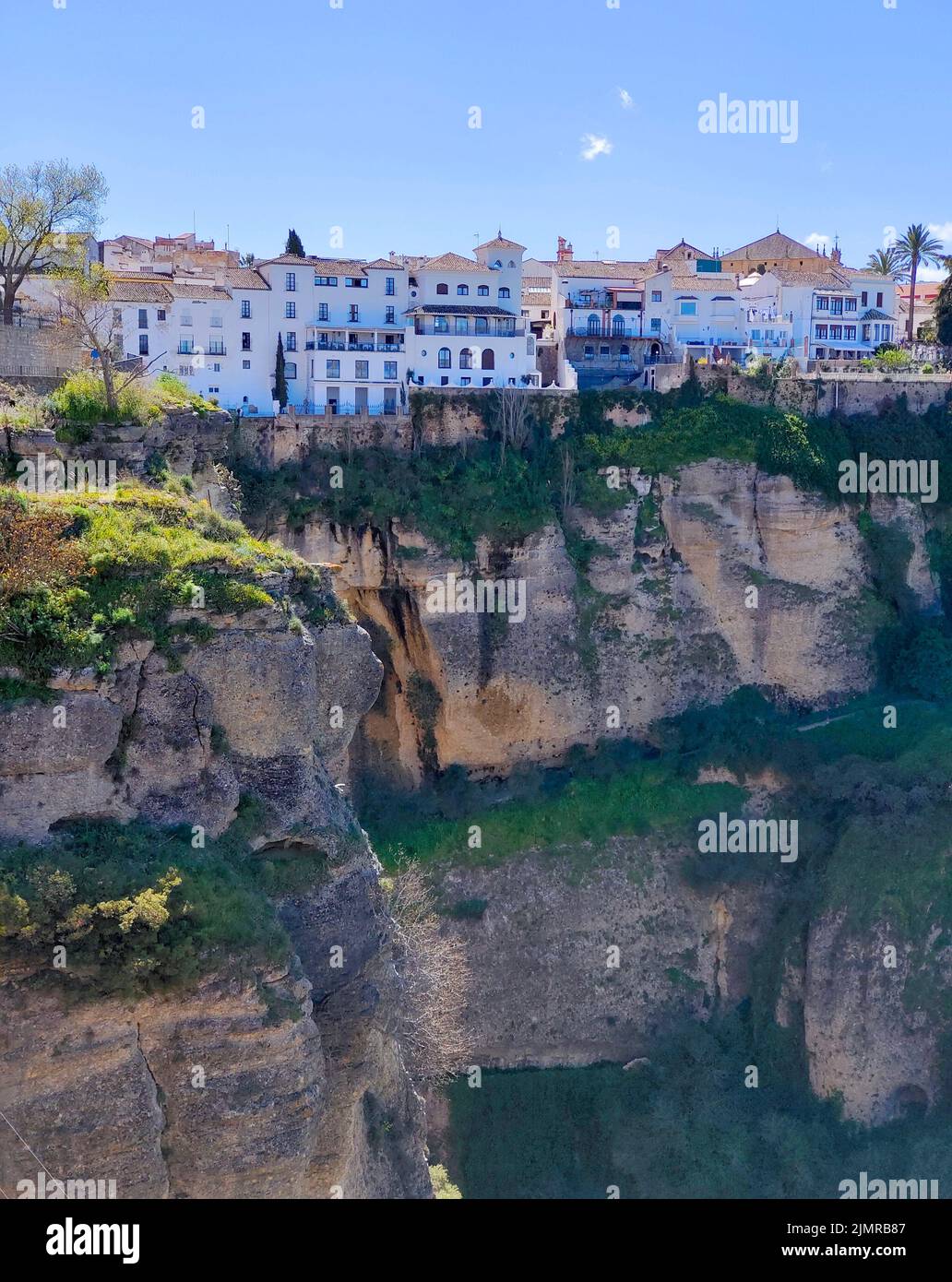 Houses in Ronda in the south of Spain in a sunny day. It´s a town in the top of the mountains Stock Photo