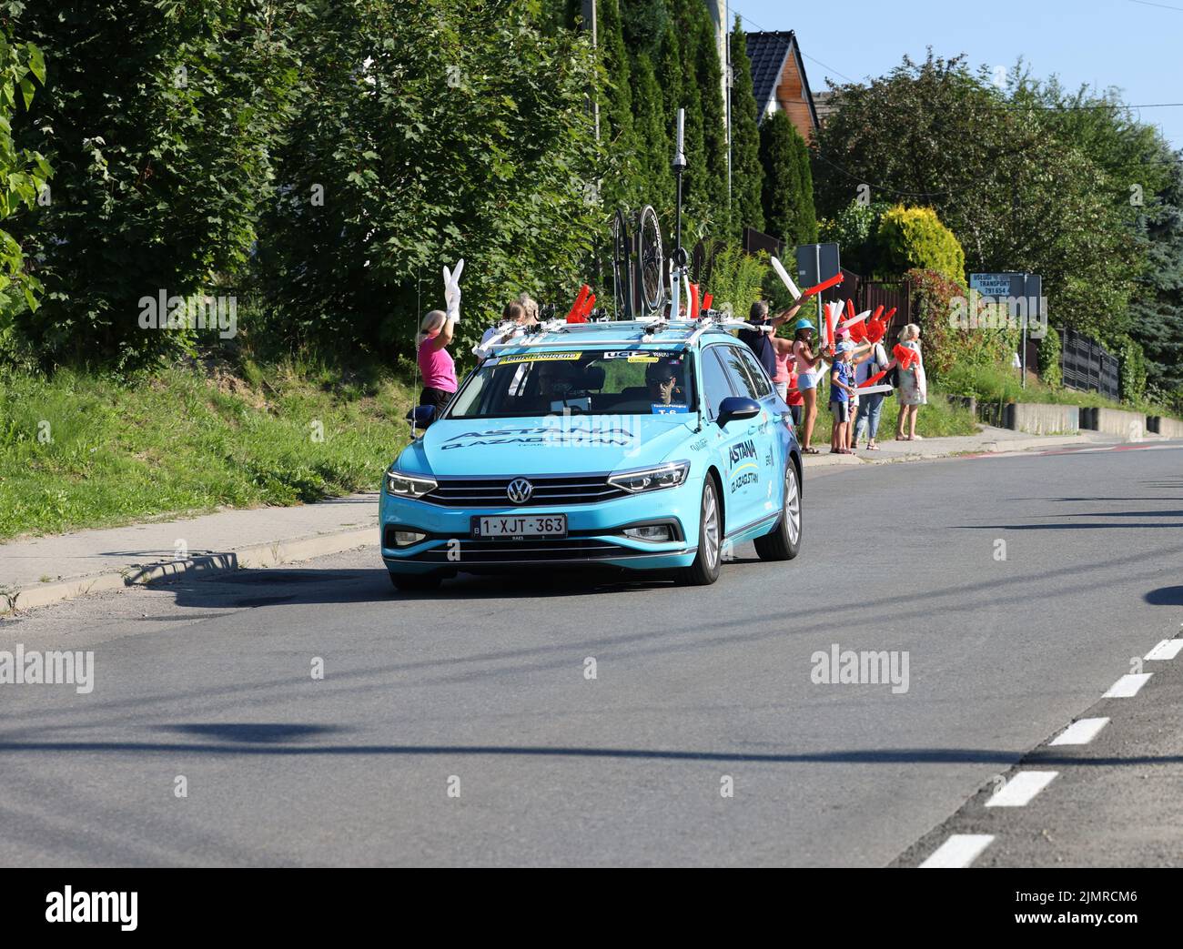 Krakow, Poland - August 5, 2022:  Astana Team vehicle on the route of Tour de Pologne UCI – World Tour, stage 7 Skawina - Krakow. The biggest cycling event in Eastern Europe. Stock Photo