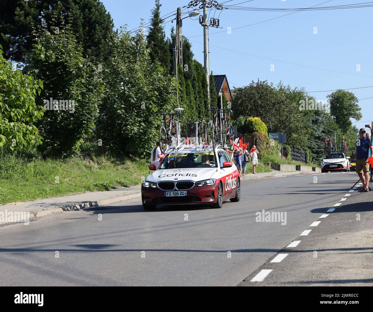 Krakow, Poland - August 5, 2022:  Cofidis Team vehicle on the route of Tour de Pologne UCI – World Tour, stage 7 Skawina - Krakow. The biggest cycling event in Eastern Europe. Stock Photo
