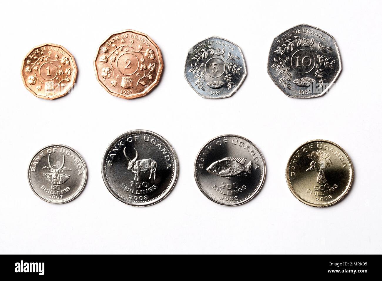 Ugandan coins on a white background Stock Photo - Alamy