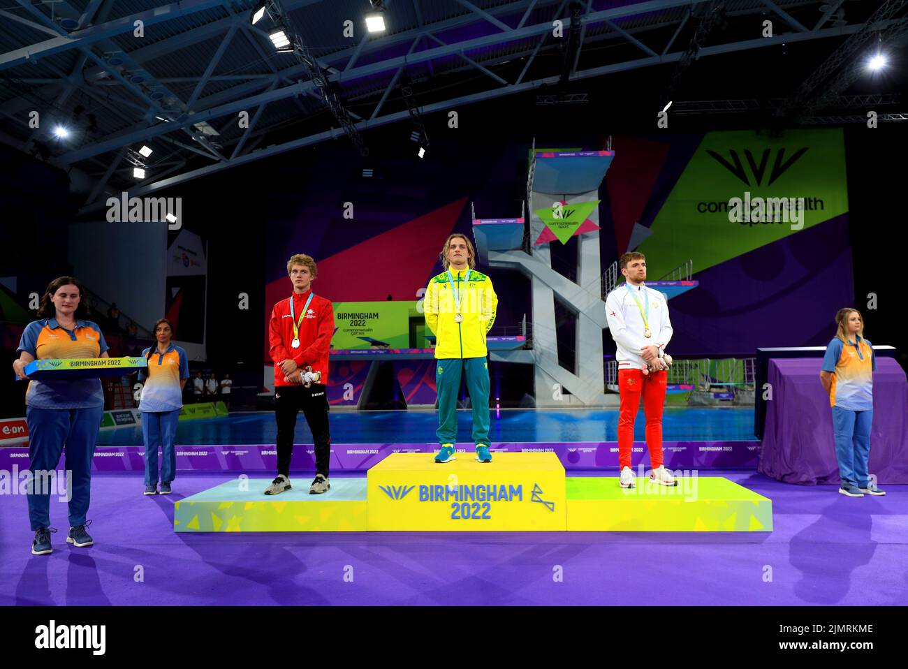 Australia's Cassiel Emmanuel Rousseau (centre) with his gold medal