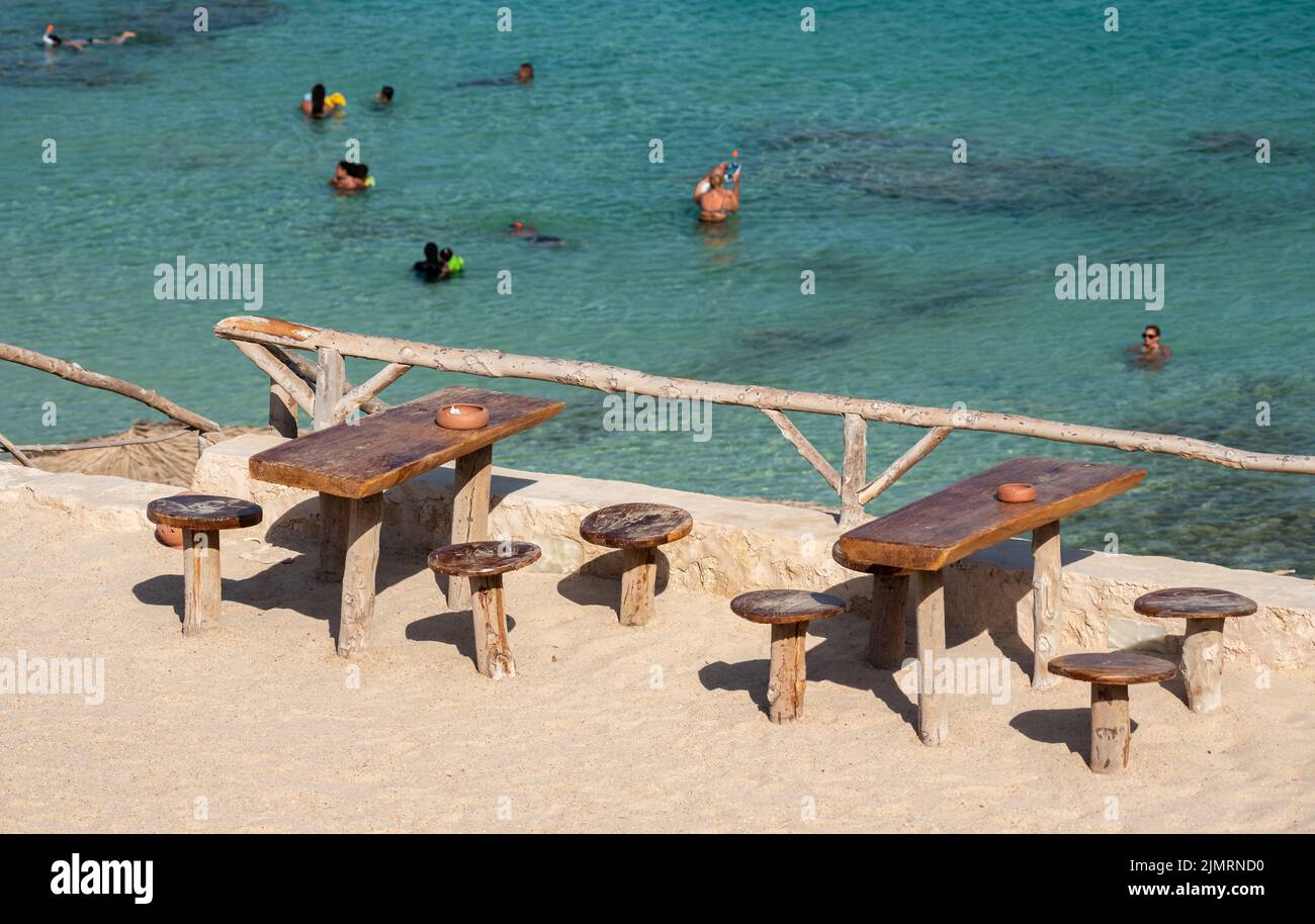 Hurghada, Egypt - August 29, 2021: Restaurant on the beach on a hot day by the sea. Holidays in Egypt. Sunny day and rest on the beach. Stock Photo