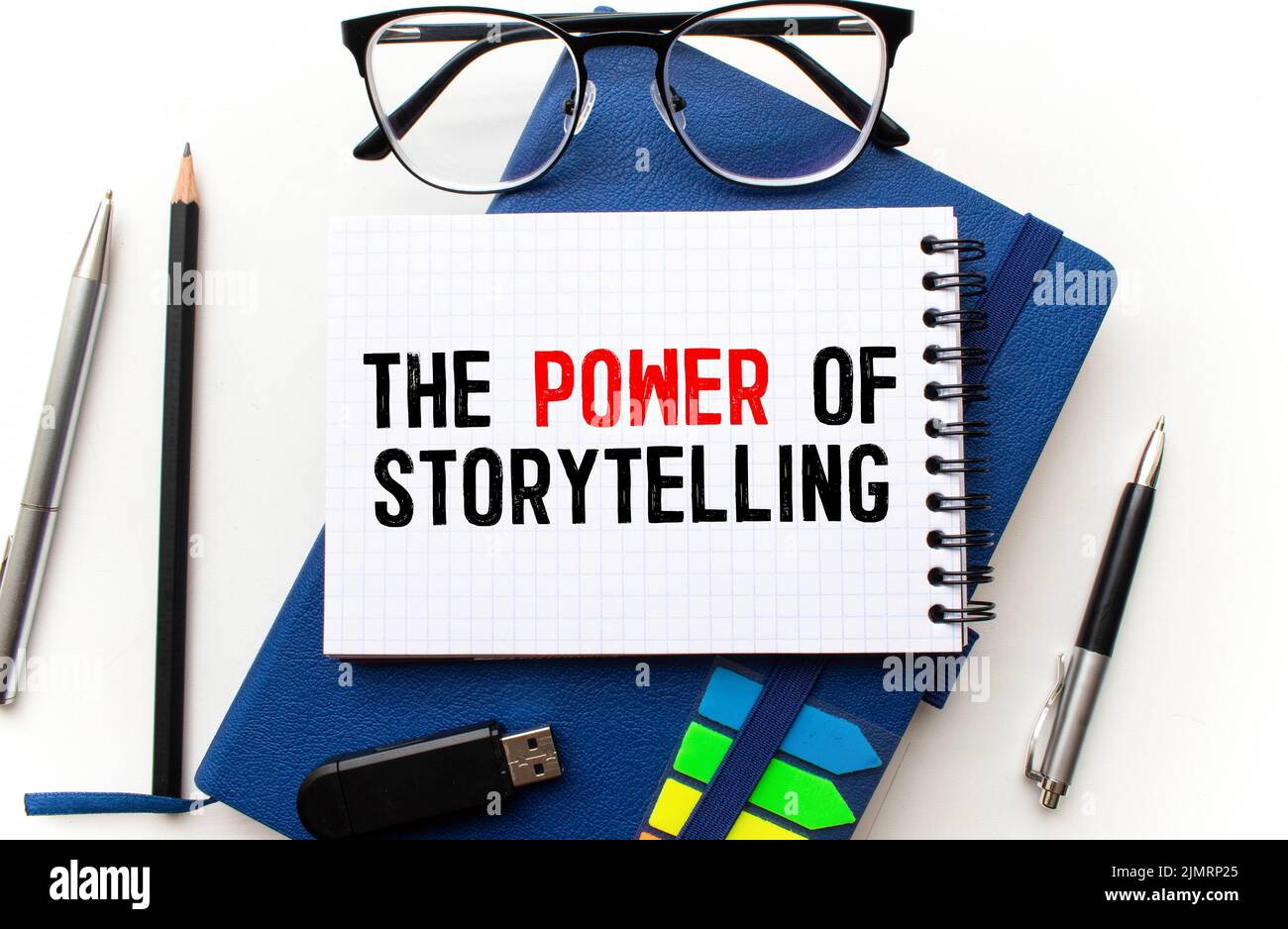 Business concept. Notebook with text THE POWER OF STORYTELLING sheet of ...