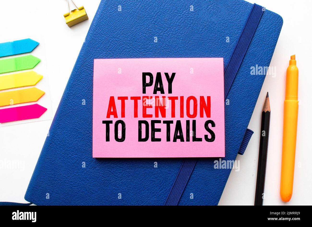 Word text Attention to detail on white paper background - business concept Stock Photo
