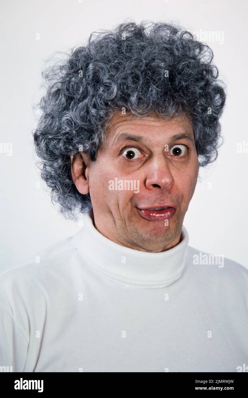 Strange man looking at camera with intense stare Stock Photo
