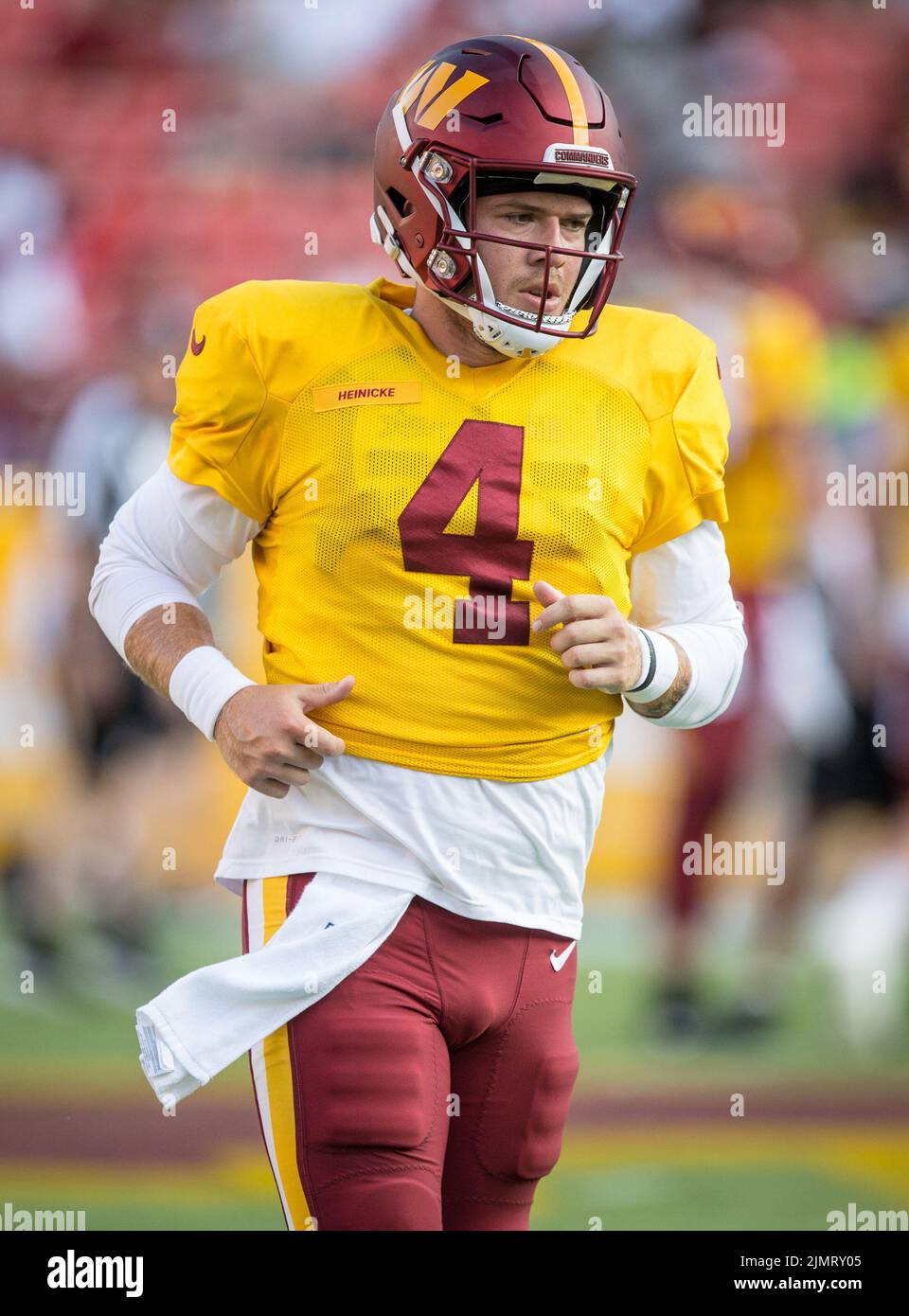 Santa Clara, California, USA. 24th Dec, 2022. Washington Commanders  quarterback Taylor Heinicke (4) gives San Francisco 49ers defensive end  Jordan Willis (75) stiff arm on Saturday, December 24, 2022, at Levis  Stadium