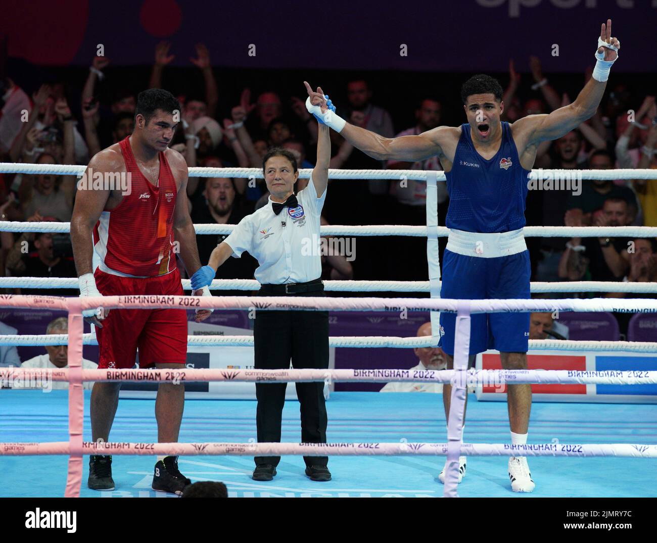 England's Delicious Orie (right) reacts after winning the Men's Super Heavy (+92kg) Final against India's Sagar Sagar at The NEC on day ten of the 2022 Commonwealth Games in Birmingham. Picture date: Sunday August 7, 2022. Stock Photo