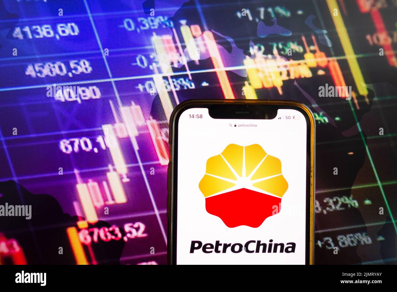 KONSKIE, POLAND - August 07, 2022: Smartphone displaying logo of PetroChina Company Limited on stock exchange diagram background Stock Photo