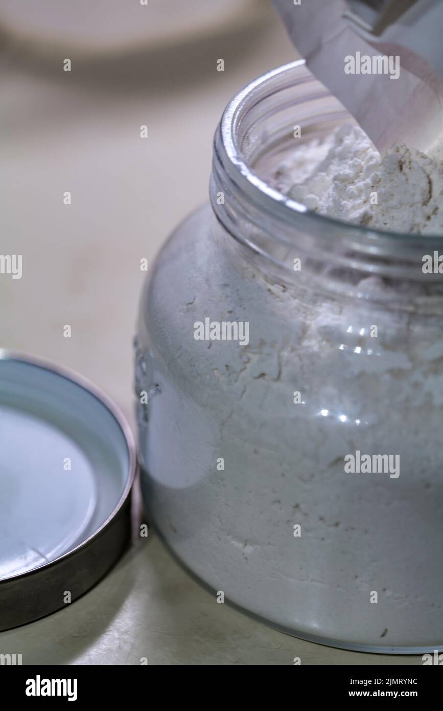 some pour the flour into a glass jar for safe storage. Protection