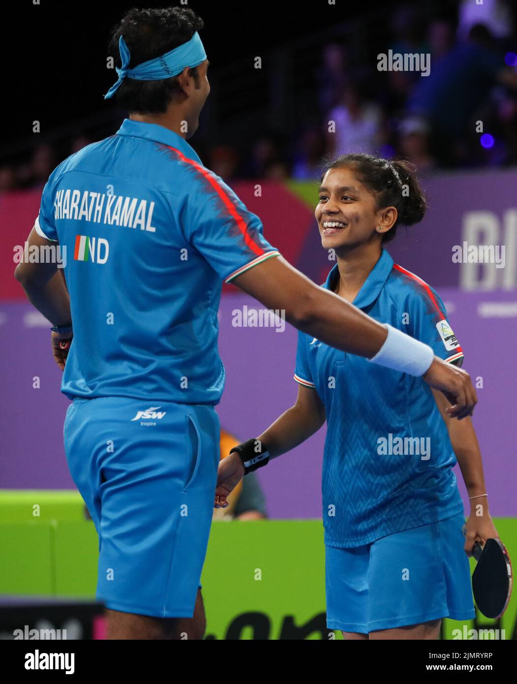 India’s Sharath Kamal Achanta and Sreeja Akula celebrate victory during