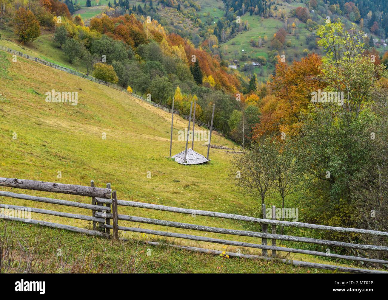 Cloudy and hazzy day autumn mountains scene. Peaceful picturesque traveling, seasonal, nature and countryside beauty concept sce Stock Photo