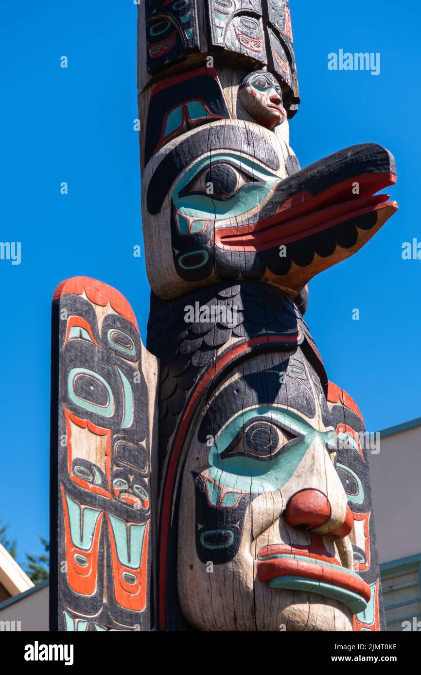 Detail of the Native Alaskan totem pole called Chief Johnson Totem Pole at the entrance to the Creek Street historic district in Ketchikan, Alaska. Stock Photo