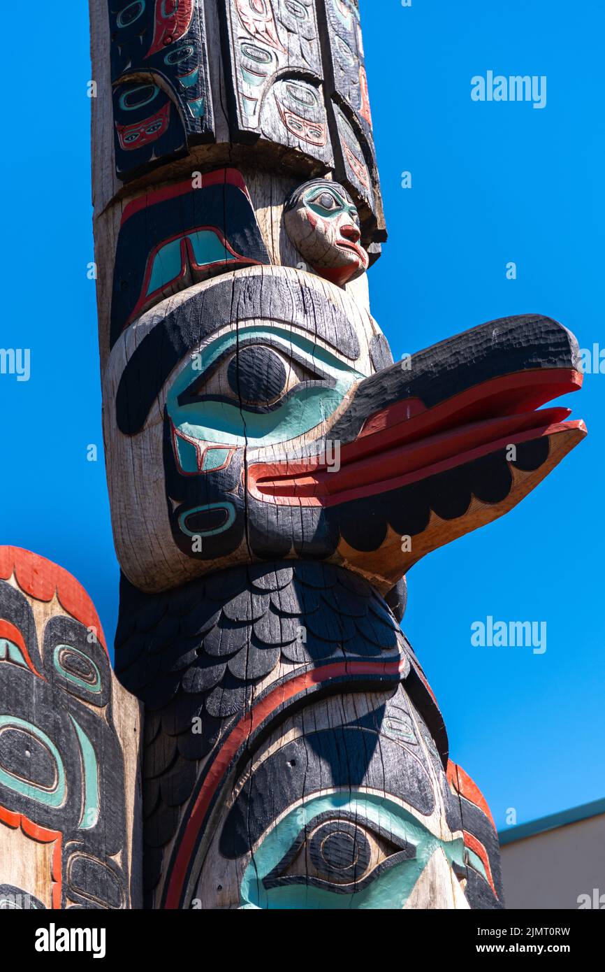 Detail of the Native Alaskan totem pole called Chief Johnson Totem Pole at the entrance to the Creek Street historic district in Ketchikan, Alaska. Stock Photo