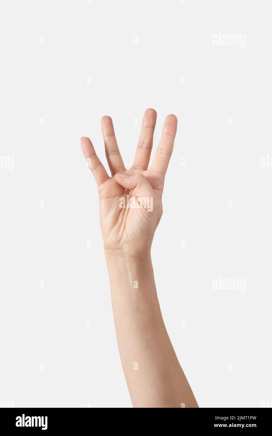Counting on fingers, four inner palm Stock Photo Alamy