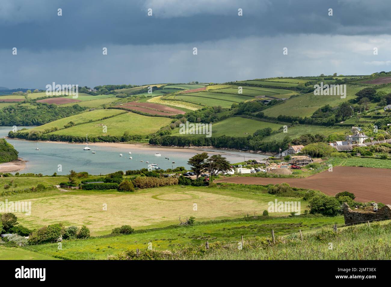 View from the South West Coastal Path near Thurlestone towards Buckland village in Devon Stock Photo
