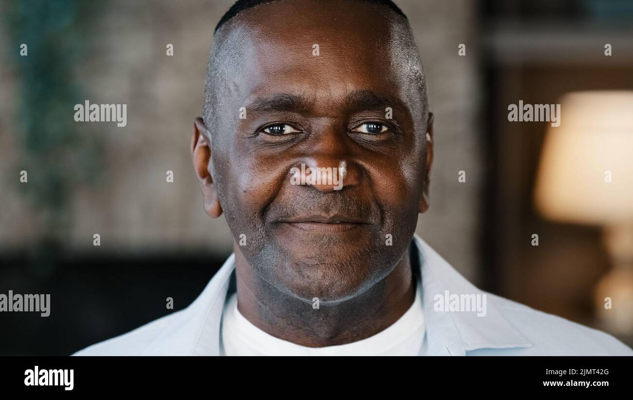 Elderly male portrait indoors of african american adult 50s man biracial senior businessman confident handsome mature grandfather bachelor middle-aged Stock Photo