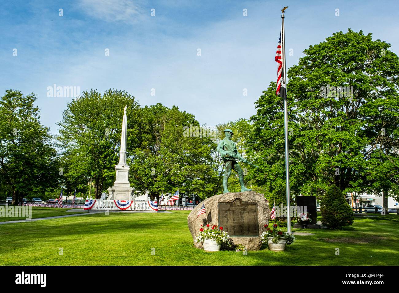 American flags decorate the Civil War Monument on the Barre, MA Town Common Stock Photo