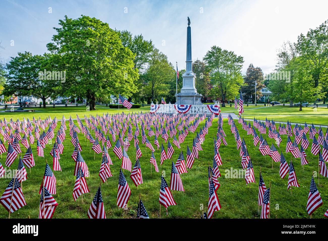 American flags decorate the Civil War Monument on the Barre, MA Town Common Stock Photo