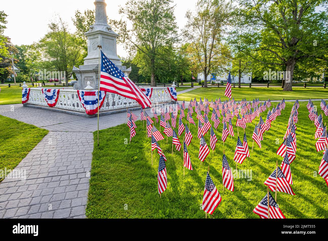 American flags decorate the Civil War Monument on the Barre, MA Town Common Stock Photo