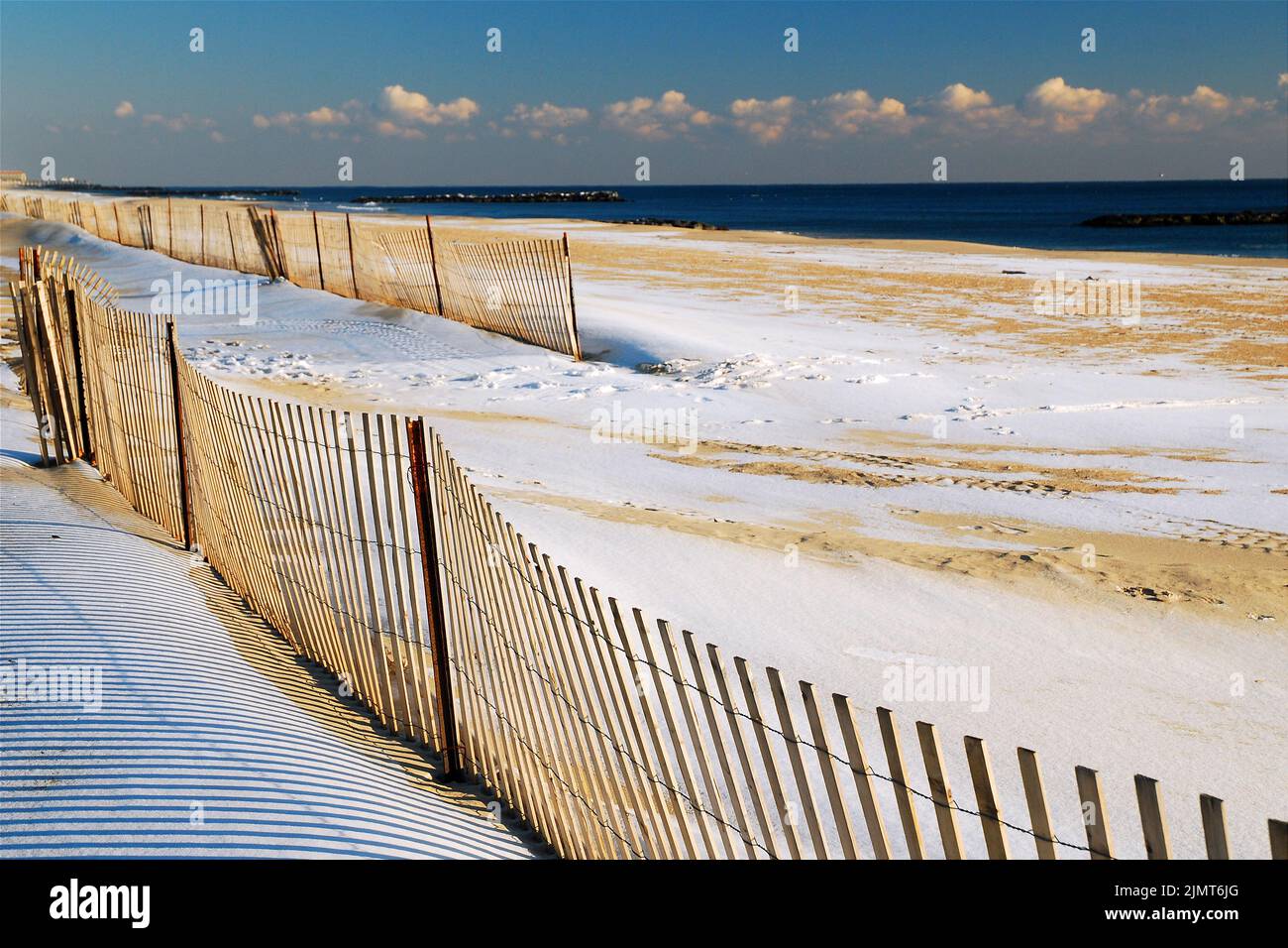 Snow covers the sand of the beach at Avon by the Sea, on the Atlantic