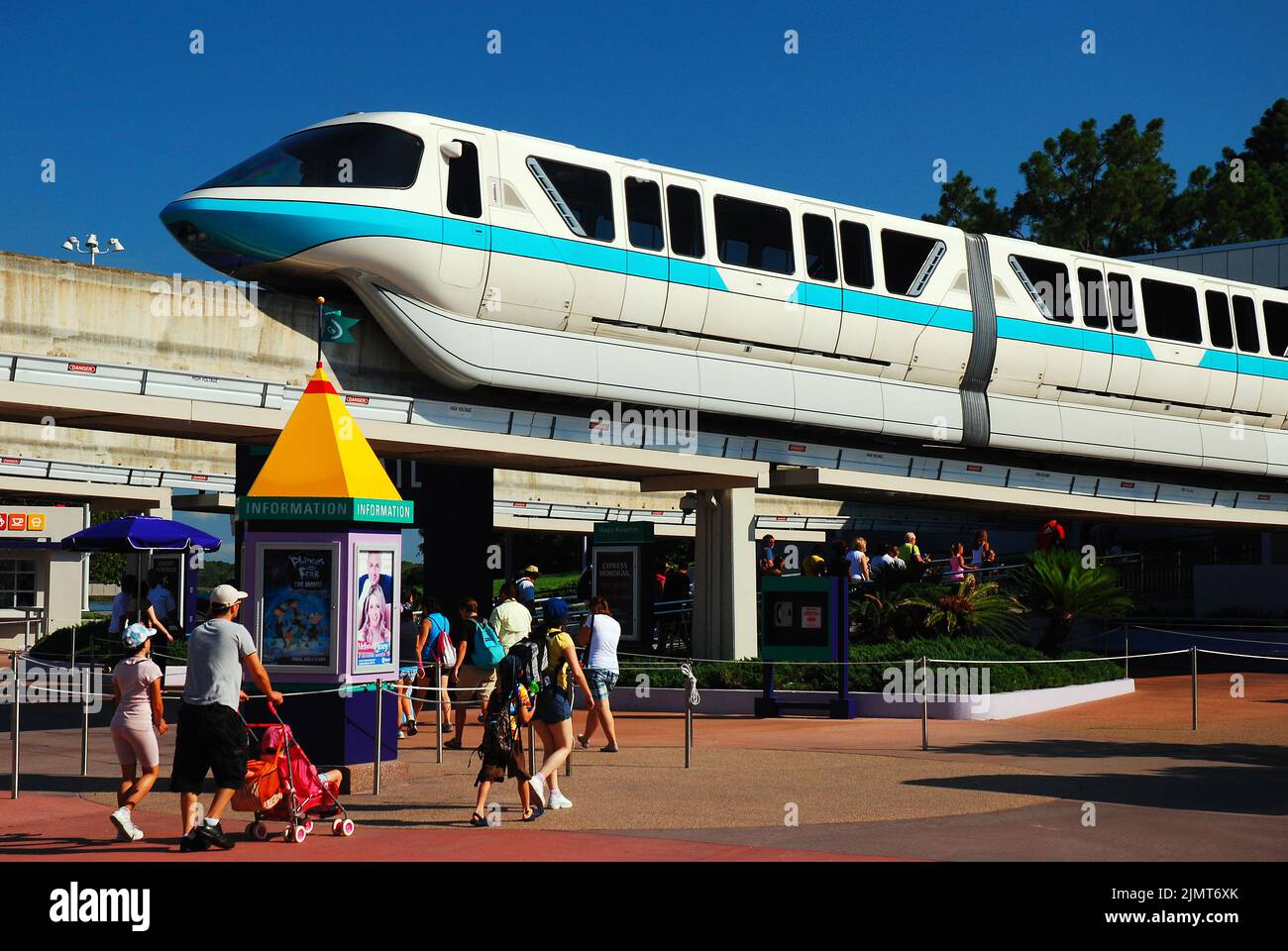 The Walk Disney World monorail pulls into a station as families begin  their day heading to the magic Kingdom for a fun filled vacation Stock Photo