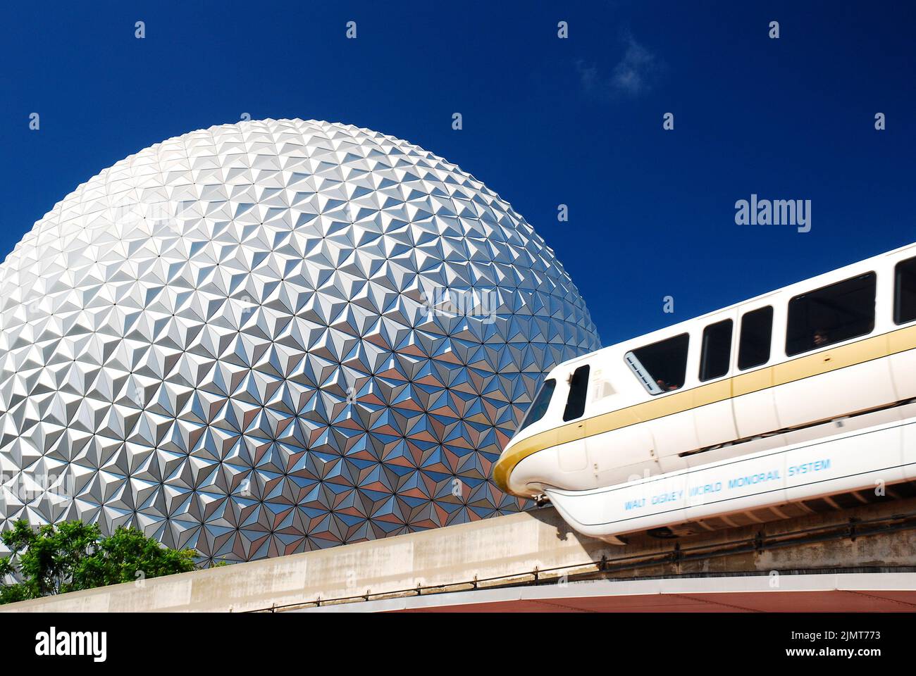AA monorail travels in front of the sphere of Spaceship Earth, a large landmark at the Epcot Center of Walt Disney World in Orlando Florida Stock Photo