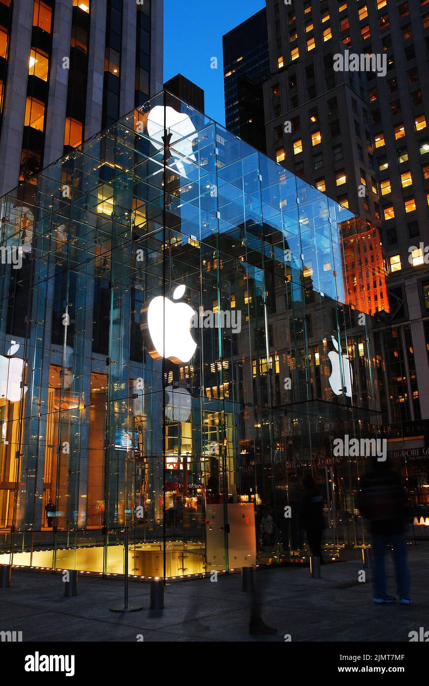 The Apple Store in  New York City, is enclosed in glass and is located under Grand Army Plaza.  The global company is a symbol og high technology Stock Photo