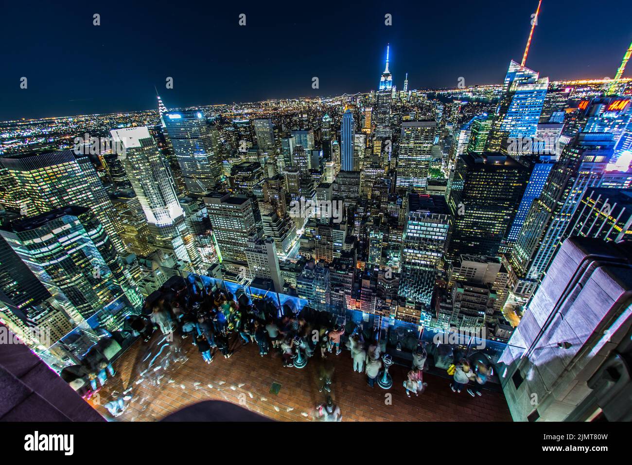 Rockefeller Center Observation Deck people 6 a view of the night view from the (top of the Rock) Stock Photo