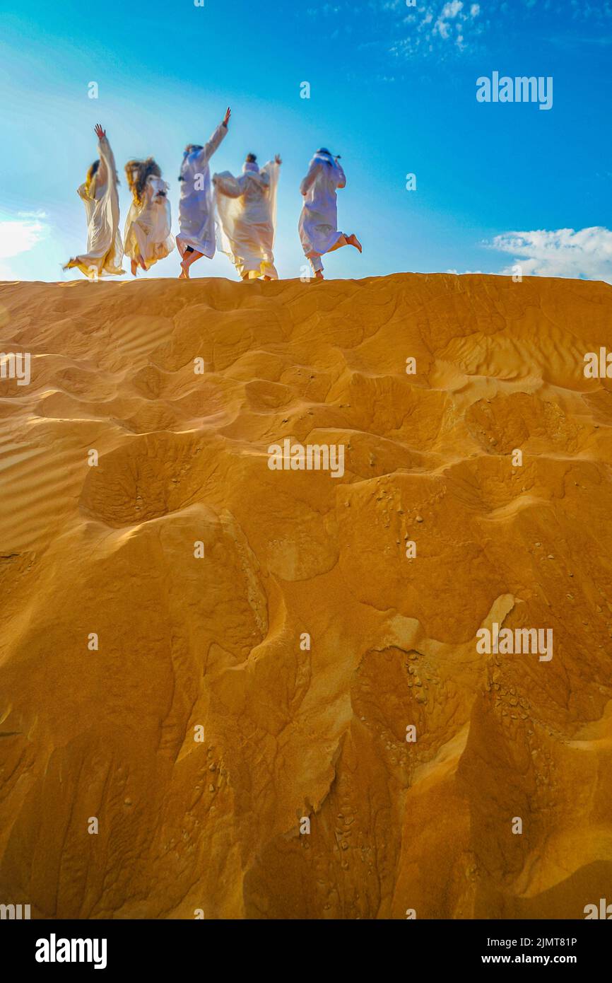 Arabian desert and people Stock Photo