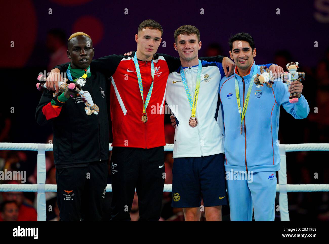 Wales' Iaon Croft (second left) with his gold medal after winning the Men's Welter (63.5-67kg) Final, alongside silver medallist Zambia's Stephen Zimba (left) and bronze medallists Scotland's Tyler Jolly (second right) and India's Rohit Tokas at The NEC on day ten of the 2022 Commonwealth Games in Birmingham. Picture date: Sunday August 7, 2022. Stock Photo