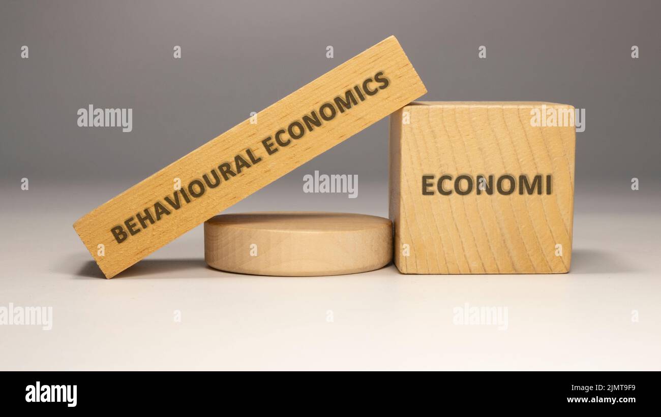Behavioral economics written on wooden surface. economy and business