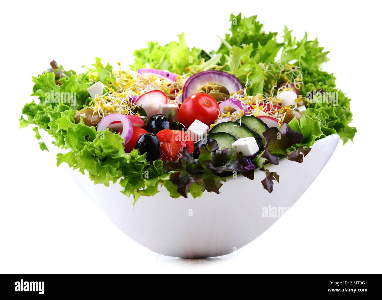 Vegetable salad bowl isolated on white background. Stock Photo