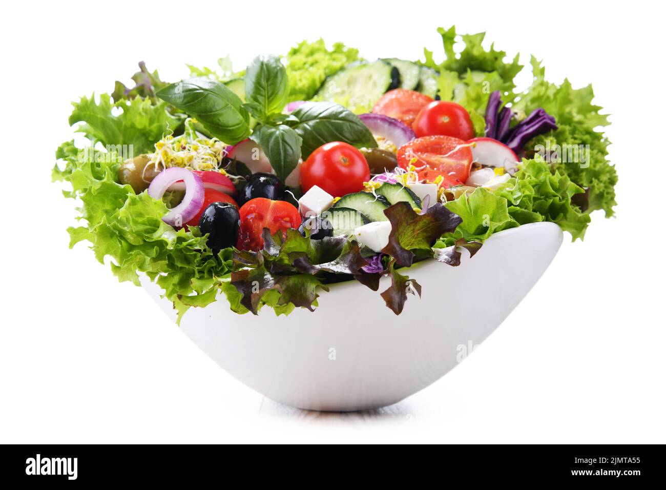 Vegetable salad bowl isolated on white background Stock Photo