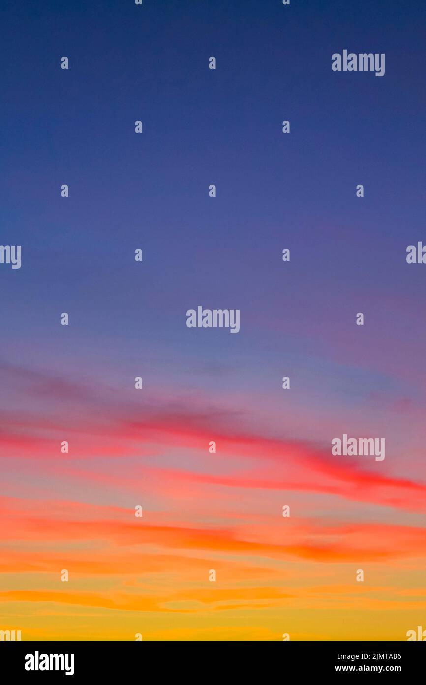 Amazing colorful pink violet blue and purple sunset sky panorama. Stock Photo