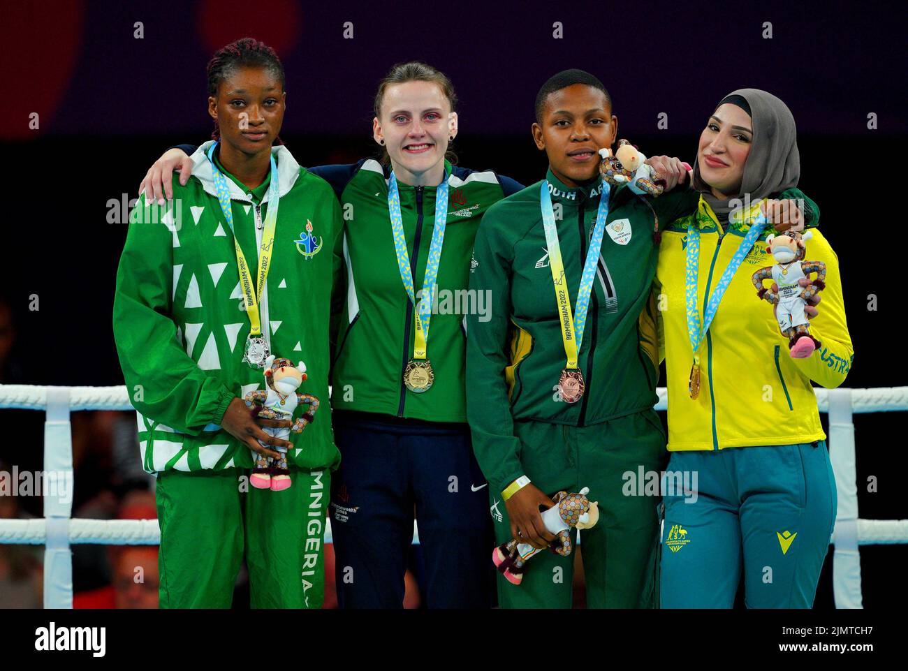 Northern Ireland's Michaela Walsh (second left) with her gold medal after winning the the Women's Over (54-57kg) Featherweight Final alongside Nigeria's Elizabeth Oshoba (left), who took silver and South Africa's Phiwokuhle Sbusisiwe Mnguni and Australia's Tina Rahimi, who both took bronze at The NEC on day ten of the 2022 Commonwealth Games in Birmingham. Picture date: Sunday August 7, 2022. Stock Photo