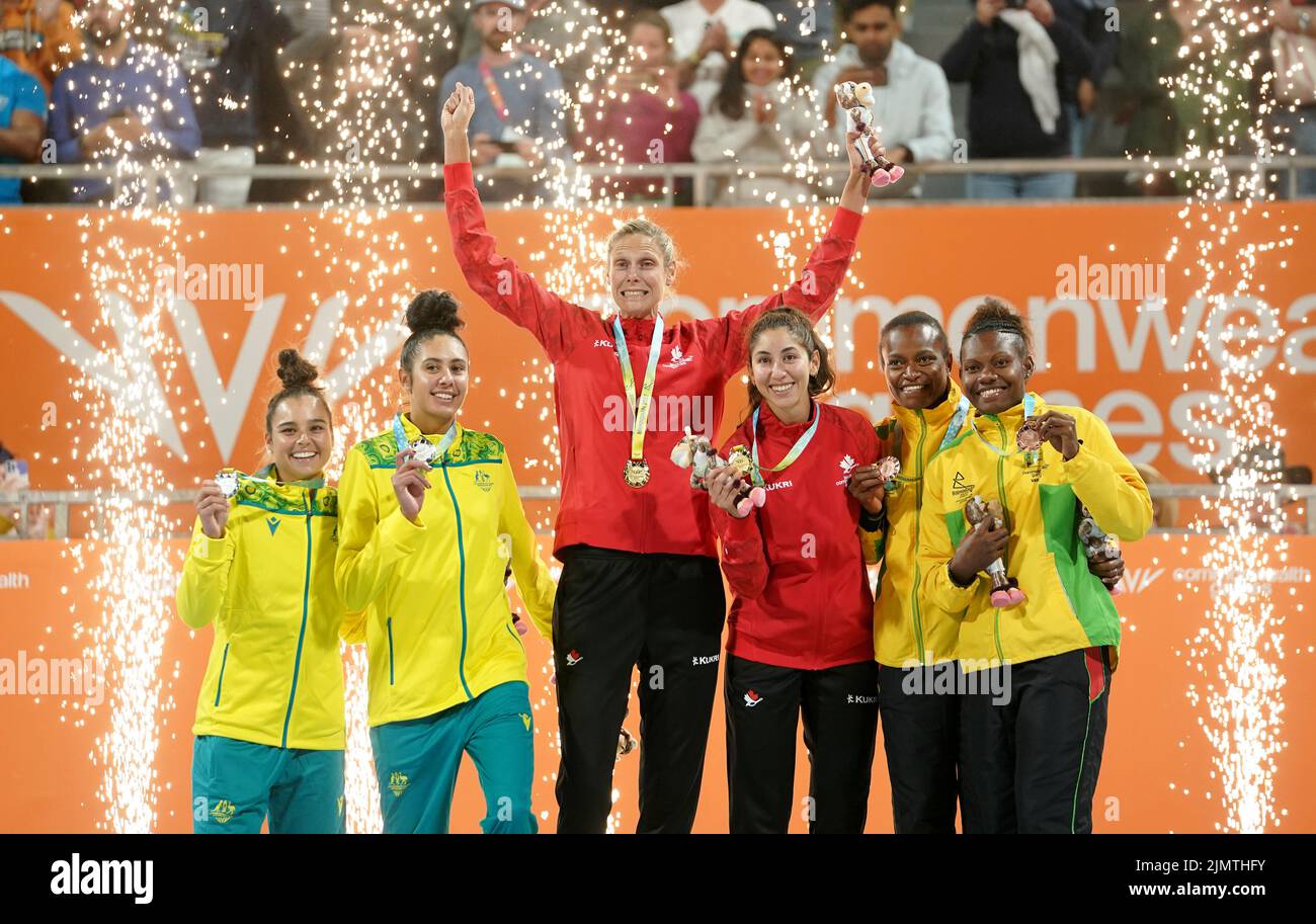 Silver medalists Australia's Mariafe Artacho del Solar and Taliqua Clancy, Gold medalists Canada's Sarah Pavan and Melissa Humana-Paredes and Bronze medalists Vanuatu's Miller Pata and Sherysyn Toko pose on the podium during the Women's Beach Volleyball - Medal ceremony at Smithfield on day ten of the 2022 Commonwealth Games in Birmingham. Picture date: Sunday August 7, 2022. Stock Photo