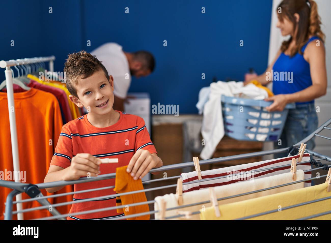 Boy doing laundry hi res stock photography and images Page 4 Alamy